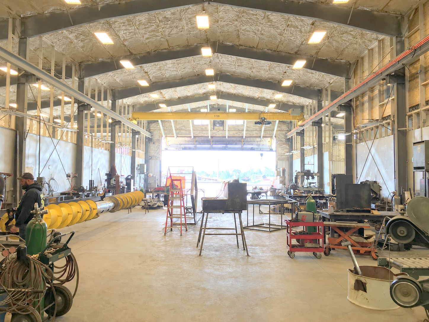 Barnes fabrication bay supporting agricultural equipment projects